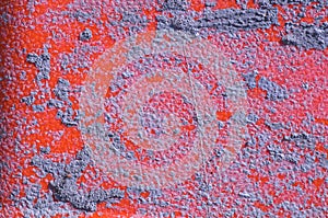 Hardened cement on a piece of red plastic.