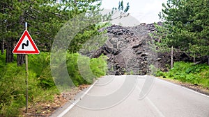 Hardened lava flow broken road on slope of Etna