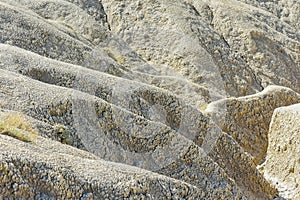 hardened lava from the muddy volcanoes