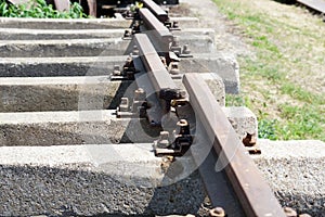 Hardened steel railroad tHardened steel railroad tracks photographed on a sunny spring dayracks photographed on a sunny spring day