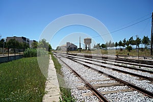 Hardened steel railroad tHardened steel railroad tracks photographed on a sunny spring dayracks photographed on a sunny spring day