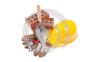 Hardhat, Glove, Brick and trowel photo