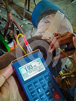 Hardness testing of alloy pipe and welding photo