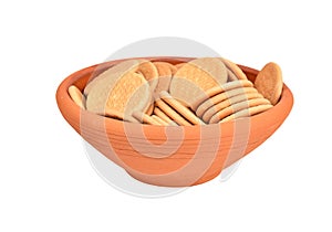 Hardtack cookie in clay bowl