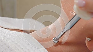 Hardware procedure in cosmetology. Close-up. Non-surgical body lifting in beauty clinic. Beautician cosmetologist doctor