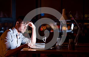 Hardworking Businessman At Laptop Working On Business Project In Office