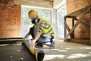 hardworking construction worker in safety helmet