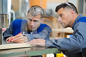 hardworking craftsman working at workbench