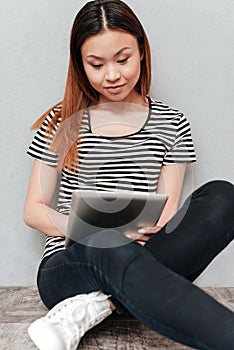 Hardworking woman working with tablet