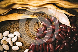 Haricot beans on old wooden table