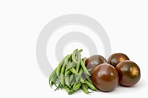 Fresh haricots and tomatoes isolated on white, copy space photo