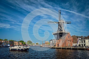 Harlem landmark windmill De Adriaan on Spaarne river. Harlem,