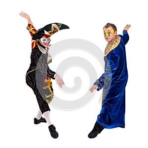 Harlequin and pierrot wearing a mask, isolated on white background in full length.