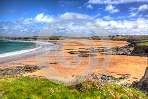 Harlyn Bay beach North Cornwall England UK near Padstow and Newquay in colourful HDR with cloudscape