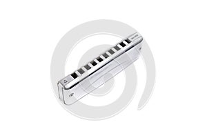 Harmonica, french harp or mouth organ isolated on white