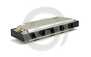 Harmonica isolated on white with shadows photo