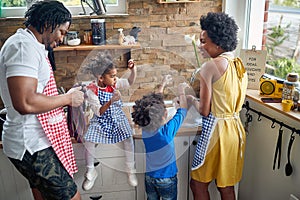 Harmonious Family Moments: Afro-American Parents and Children Bonding in the Kitchen