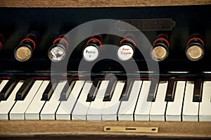 Harmonium. Pump organ. Antique Pedal Organ. Christian detaill - organ in church. Antique organ in chapel. Radomyshl. Vintage pedal