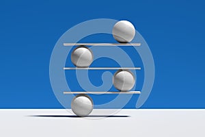 Harmony, balance, equilibrium and stability concepts. Spheres balancing on a seesaw