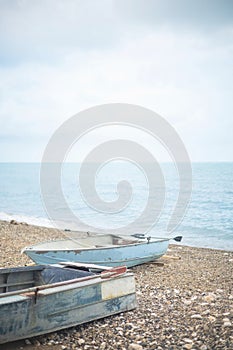 Harmony coastline landscape life balance decrepit old rusted boat at seashore spiritually sea beach photo