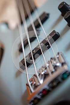 Harmony in Focus: Close-Up of Bass Guitar Strings