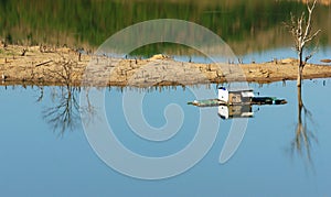 Harmony landscape, floating house ,reflection, dry tree