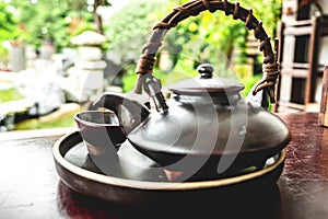 Harmony and Wellness: Japanese Healthy Green Tea in Small Cups and Teapot