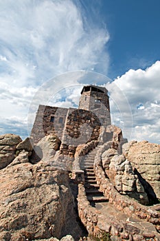 Harney Peak Fire Lookout Tower stone staircase under cirrus cloudscape in Custer State Park in the Black Hills of South Dakota