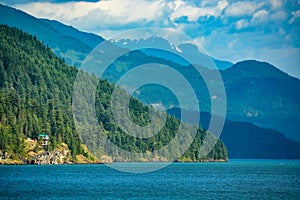 Harrison lake overview with residential house on the shore