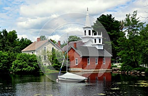 Harrisville, NH: View over Harrisville Pond to the Village