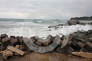 Harsh seashore. Harsh coast. Big waves.