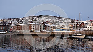 Harstad city harbour at sunrise in winter in Northern Norway