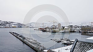 Harstad harbour in winter in Northern Norway