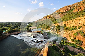 Hartbeespoort Dam and waterfall, Pretoria at sunset