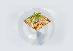 Harusame Rice Noodles with chicken in white carton takeaway delivery box. Food delivery package with ready to eat dish inside