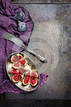 Harvest fall autumn concept. Ripe juicy violet figs