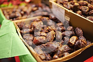 Harvest, natural and bunch of organic dates for nutrition, health and wellness diet snack. Sustainable, farmers market