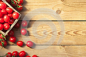 Harvest of ripe red cherry tomatoes