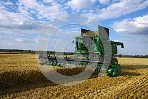 Harvester on agriculture field