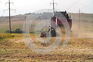 Harvester combine autumn graine wheat farmer worker plantation technology green field