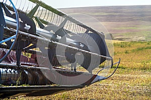 Harvester combine autumn graine wheat farmer worker plantation technology green field
