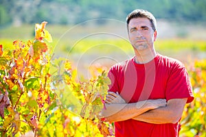 Harvester winemaker farmer proud of his vineyard