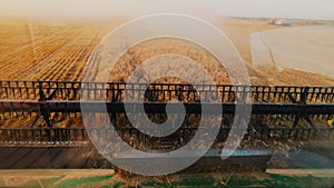 Harvesters for harvesting grain while working. View from the combine harvester cab, harvesting machinery in the field