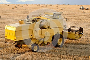 Harvesting and agricultural machine on farm