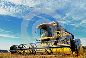 Harvesting combine in the field