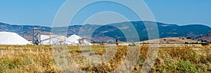 Harvesting salt on the flats between mountians and sea