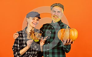 Harvesting season. Autumn harvesting works. Work at fields. Harvest festival. Farmers market. Autumn mood. Couple in