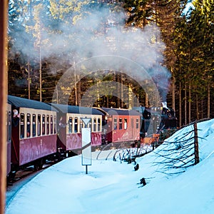 Harz national park Germany, historic steam train in the winter, Drei Annen Hohe, Germany,Steam locomotive of the Harzer