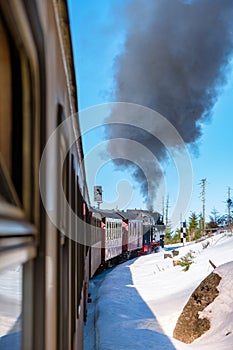 Harz national park Germany, Steam train on the way to Brocken through winter landscape, Famous steam train throught the