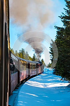 Harz national park Germany, Steam train on the way to Brocken through winter landscape, Famous steam train throught the